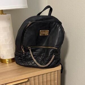 bebe Black Quilted Faux Leather Backpack with Gold Chain Detail